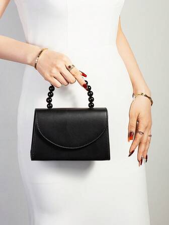 优雅女士珍珠PU皮手提包，专为女士设计，魅力四射，适合各种派对场合，可搭配晚礼服、婚纱、正式礼服、紧身裙等，是婚礼、聚会、宴会、派对、舞会等场合的理想之选，也是馈赠女士的理想礼物。