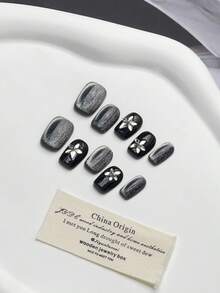 10PCS High-Quality Handmade Giant Black Starry Sky Cat Eye Sparkling Frosted Short Press Nails Suitable For Women's Daily Wear, Parties, And Gatherings. Black Press Nails Come With Jelly Glue And Rubbing Strips As A Gift. [Essential Nails For Autumn And Winter]