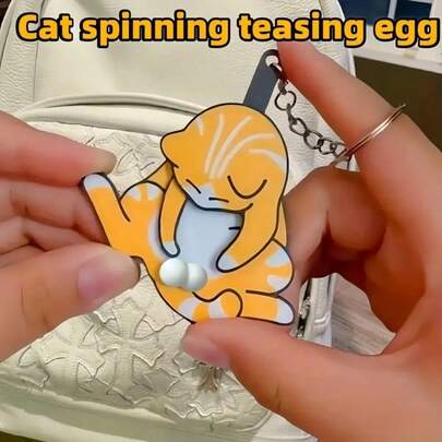 Orange Cat Trick-Or-Touch Stretching And Playing With Eggs Cat Spinning Eggs Keychain Pendant, Cute Funny Prank Backpack Travel Bag Pendant Ornament - Pure Friendship And Love Gift, For And Perfect For Halloween & Christmas Gifts. Suitable For Men And Women.