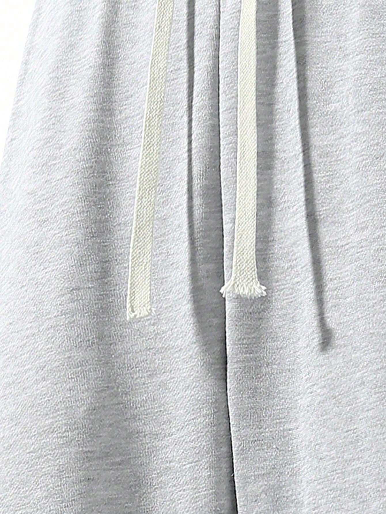 بنطلون رياضي رجالي فضفاض ذو ساق مستقيمة، باللون ال...