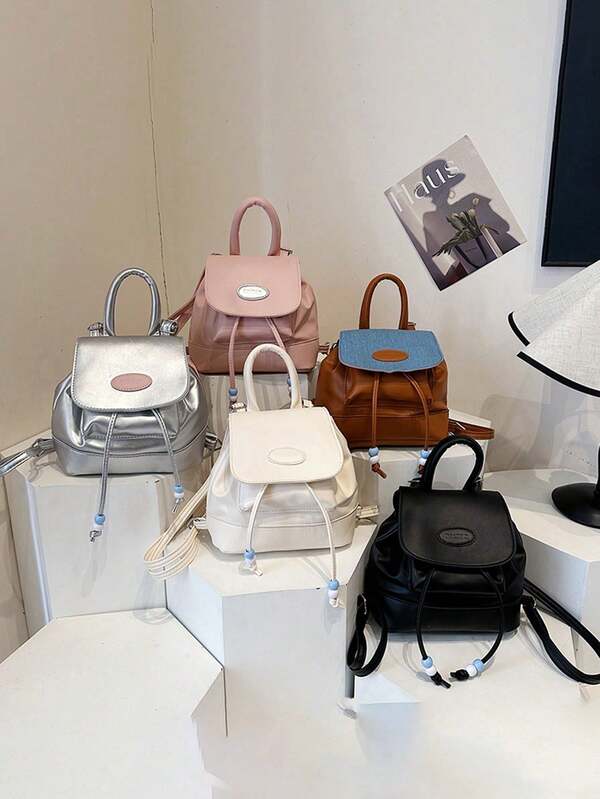 新款抽绳背包休闲简约，配有抽绳袖口和可调节肩带。适合上学和旅行，可轻松收纳日常用品。它是一款百搭单品，也是时尚新宠，适合所有风格和场合，风格适应性强。