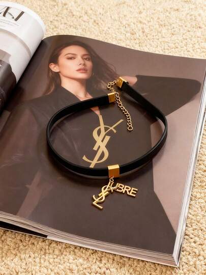 Collar y pulsera 2 en 1 de mujer de YSL en negro y dorado