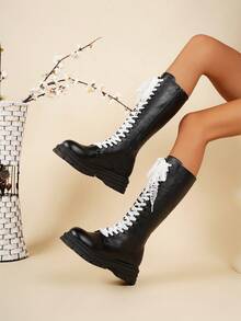 بوت نسائية طويلة حتى منتصف الساق مع سحاب وأربطة، متوفرة بالمقاسات من 35 إلى 43، بوت فارس ذات أربطة وساق طويلة تصل إلى أعلى الركبة، بوت دراجات نارية للنساء، مناسبة للخريف والشتاء