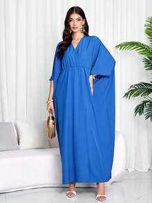 优雅蓝色V领蝙蝠袖长款连衣裙，七分长款，飘逸的阿拉伯风格开衩连衣裙