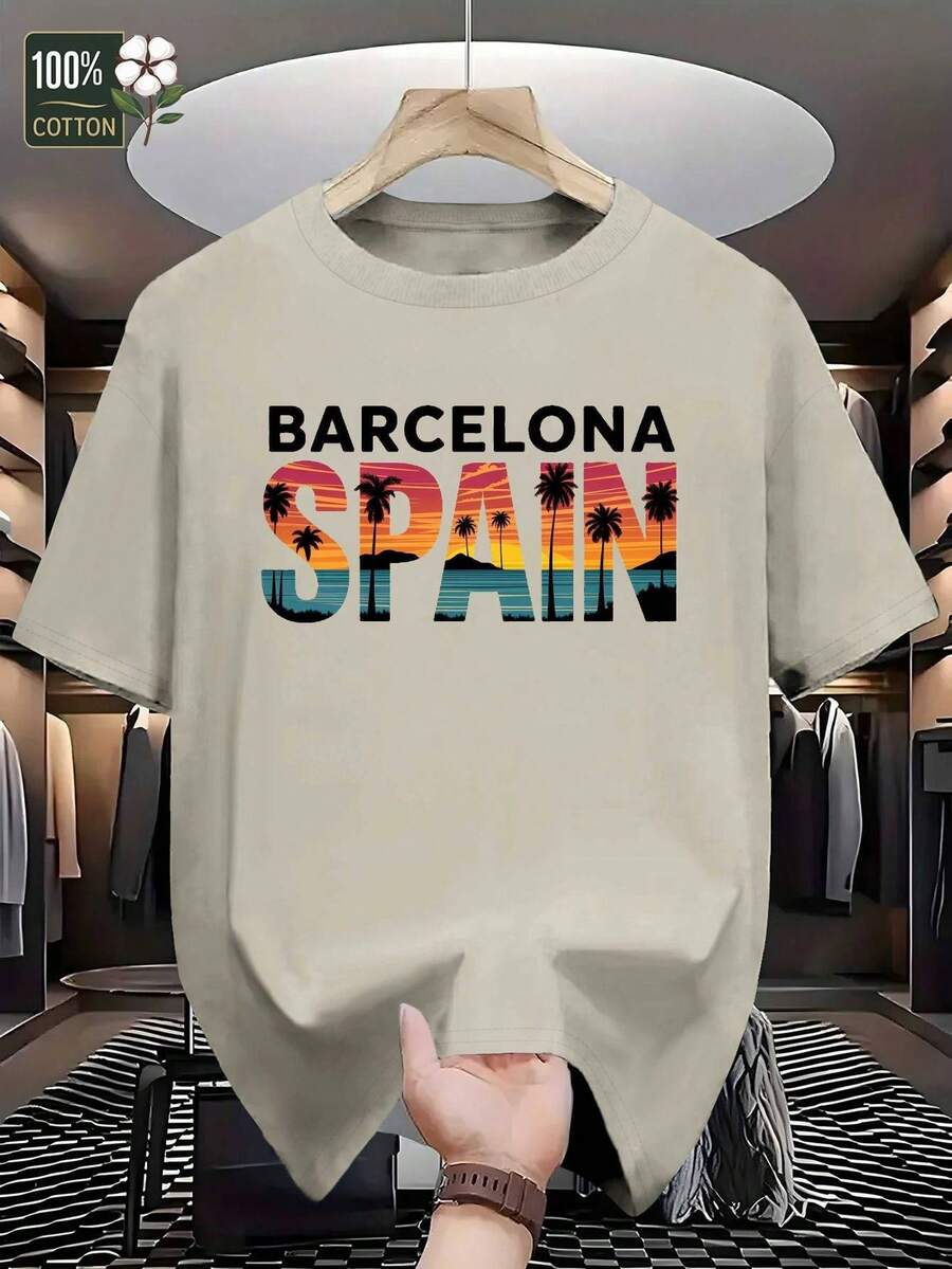 Camiseta Gráfica de Barcelona, España para Hombres GILDAN - 100% Colores del Bandera Española (Rojo, Amarillo, Azul, Verde) - Diseño Capital Catalana - Camisa Ligera y Fresca Ideal Para Aficionados al Barça, Recuerdo Turístico o Uso Casual Diario - Lavable a Máquina - Corte Relajado con Cuello Redondo en Blanco Estampada Palmeras Puesta Sol Banderín Deportivo Al Aire Libre