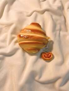 1个趣味硅胶3D羊角面包造型保护套，兼容苹果第一代/第二代蓝牙耳机。兼容苹果蓝牙耳机1/2/3/4/Pro/Pro（第二代），耳机保护套，保护套