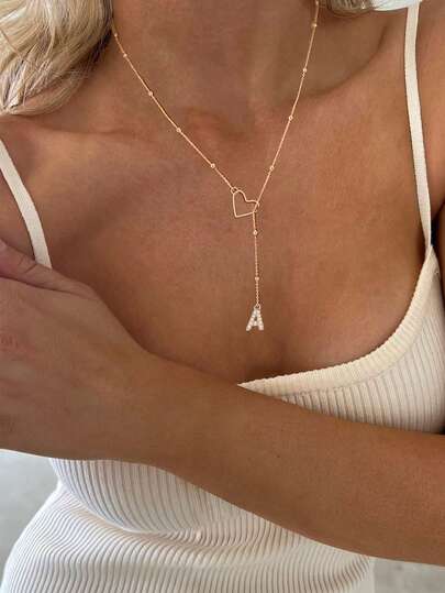 1 Dây chuyền mặt dài 50cm, dây chữ Y có mặt bi tròn, phù hợp cho trang phục hàng ngày và đi nghỉ của phụ nữ