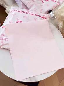 20个粉色蝴蝶结防水快递袋，采用全新PE材质，加厚邮寄袋，适用于运输、衣物收纳、文具、派对礼品包装等，用途广泛，密封方便，是理想的圣诞礼品包装。 - 粉色 - 查看 3