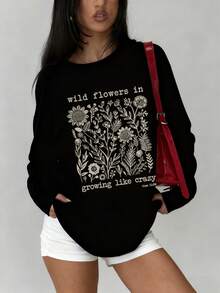 Damen Herbst und Winter Blumen und Slogan Grafik Rundhals Langarm T-Shirt, lässiger, locker sitzender und vielseitiger Urlaubsstil Oberteil, modische Herbstbekleidung für Damen, geeignet für den täglichen Gebrauch - Schwarz - Übersicht 1