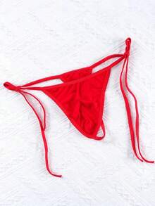 1件男士定制文字系带设计，红色弹力面料，舒适性感，个性化迷人丁字裤，适合亲密场合和情人节。