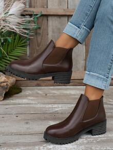 بوت نسائية من الجلد المصنع المضفر باللون الأحادي الرجعي، للاستخدام الداخلي في الشتاء - عنابي اللون - مشاهدة 1