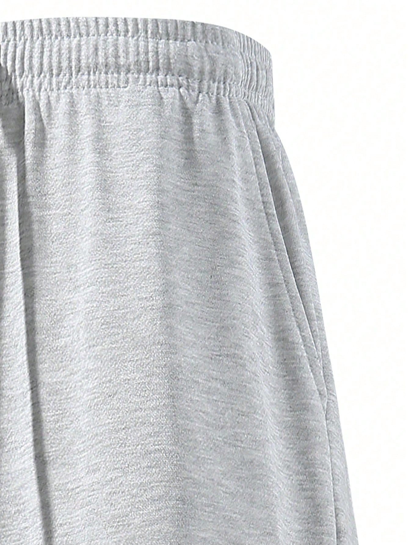 بنطلون رياضي رجالي فضفاض ذو ساق مستقيمة، باللون ال...