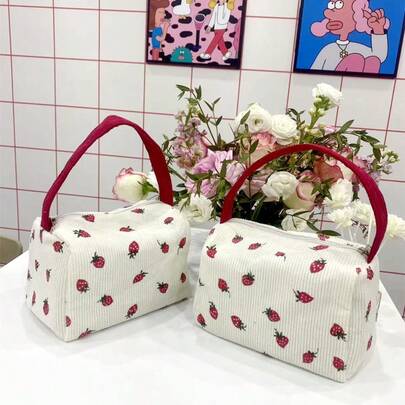 1个灯芯绒小巧多功能化妆包，便携手持可爱草莓化妆包，多功能收纳袋