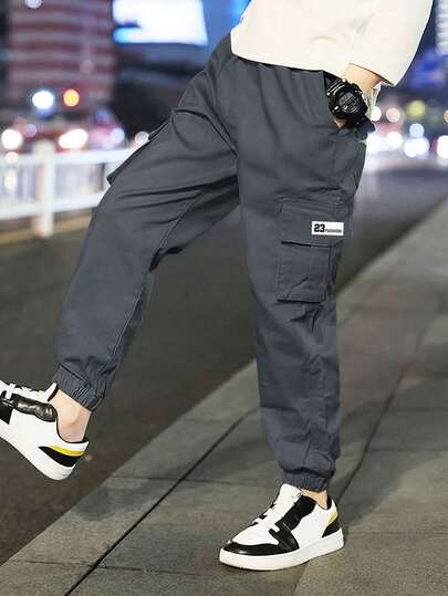 1 pieza Pantalones cargo casuales y deportivos para niños preadolescentes, pantalones rectos de unicolor con forro térmico, gruesos y cálidos para primavera, otoño e invierno