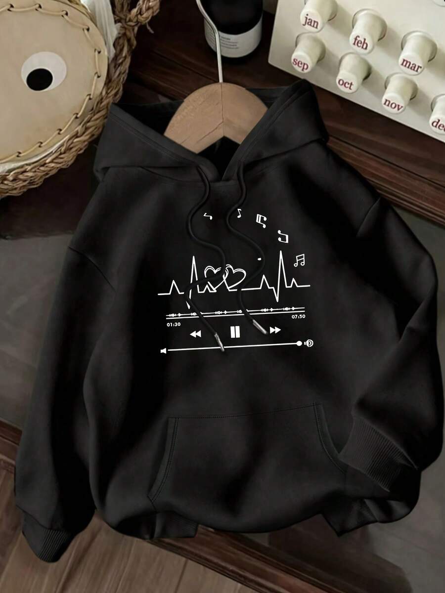 Sudadera casual negra para mujer con diseño gráfico de música y latido cardíaco - "Amor" diseño, bolsillos y cordones ajustables - Perfecta para primavera, otoño e invierno, sudadera casual| Sudadera temática de música| Ajuste cómodo - Negro - Ver 1