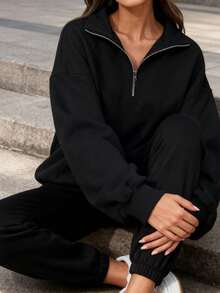 A Loose-Fitting Women's Sweatshirt With A Half-Zip Stand-Up Collar And Drawstring Casual Pants Creates A Relaxed And Sporty Women's Set. This Outfit Features A Loose And Casual Fit, Perfect For Comfortable Everyday Wear. - 黑色 - 查看 4