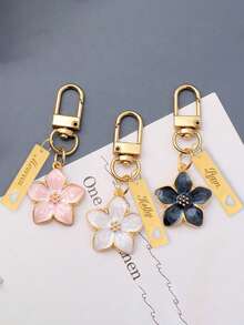 1个定制金属樱花钥匙扣，个性化不锈钢钥匙圈，可刻字，时尚复古，简约独特，秋季新款设计，男女通用，轻巧优雅的樱花造型，带吊牌，适合挂在包包、车钥匙上，情侣及节日礼物之选，精致浪漫