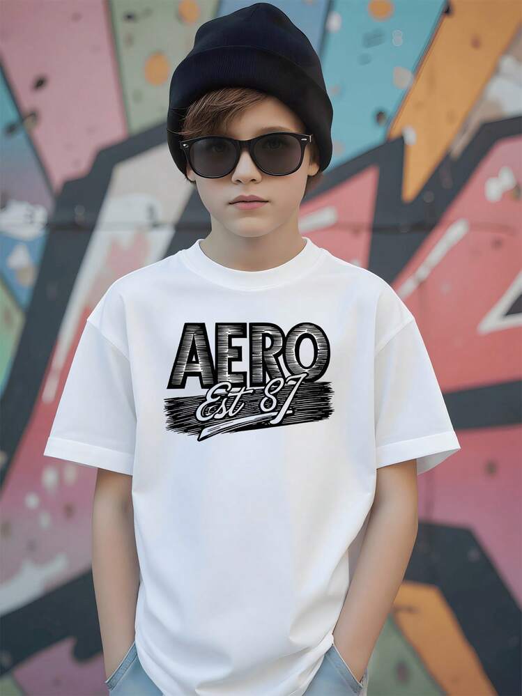 Diseño De Texto Aero Est 87 Representa Espíritu De Libertad Juventud Y Energía Urbana Inspirando Confianza En Cada Día Activo Camiseta De Niño Mangas Cortas Algodón Suave Ropa Infantil Casual Estilo Moderno Verano Moda Niños - Blanco - Añade 1