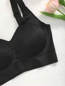 Set de 3 sujetadores deportivos sin costuras, transpirables y inalámbricos para mujeres - Cobertura total, antideslizante, con elevación y soporte, ajuste cómodo con detalles acanalados, mezcla de nailon y elastano, lavar a mano - unicolor elegantes - Negro+Albaricoque+Marrón - Ver 10