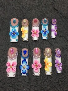 This Is A 10-Piece Handcrafted Coffin-Shaped Press-On Nail Set-A Colorful 3D Floral-Style Extended Press-On Nail Collection. With White And Light Pink As The Base, It Is Paired With Handcrafted 3D Colorful Floral Decorations In Shades Of Blue, Yellow, Pink, And Purple, Complemented By Matching Rhinestone And Bead Edging, Presenting A Lively And Sweet Overall Style. - Nhiều màu - Xem 2