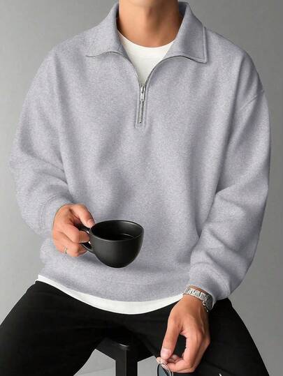 新款纯色简约半拉链男士卫衣，时尚休闲宽松套头衫，带领，适合秋冬季穿着。