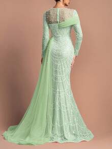 Đầm dạ hội dài tay cổ tròn đính cườm sang trọng dành cho nữ - Cổ áo đính ngọc trai, vạt voan bất đối xứng và chân váy đuôi cá ôm sát | Hoàn hảo cho các bữa tiệc trang trọng, dạ hội và đám cưới | Kết hợp với trang sức lấp lánh và giày cao gót quai mảnh. - Màu xanh Bạc hà - Xem 1