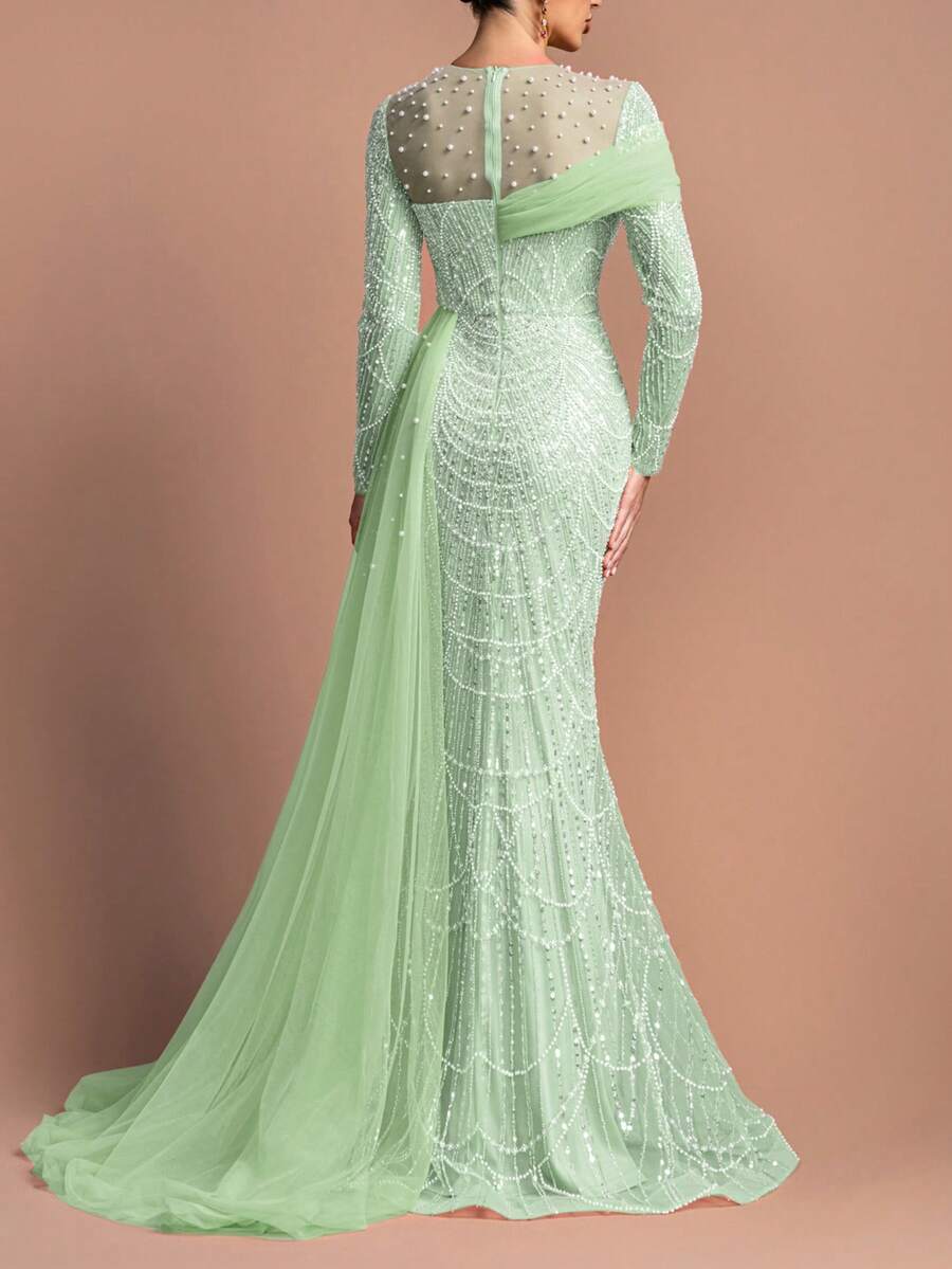 Đầm dạ hội dài tay cổ tròn đính cườm sang trọng dành cho nữ - Cổ áo đính ngọc trai, vạt voan bất đối xứng và chân váy đuôi cá ôm sát | Hoàn hảo cho các bữa tiệc trang trọng, dạ hội và đám cưới | Kết hợp với trang sức lấp lánh và giày cao gót quai mảnh. - Màu xanh Bạc hà - Xem 1