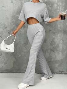 Conjunto set de dos piezas de cárdigan blusa holgada crop top y pantalon tejido acanalado tela texturizada de manga larga de color sólido casual para mujer de otoño e invierno - Gris Claro - Ver 1