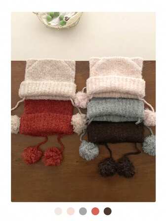 可爱毛球猫耳针织帽，带毛球抽绳，帽檐可折叠，保暖舒适。