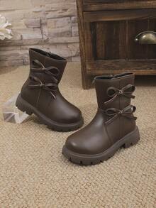1双棕色女童柔软舒适PU皮靴，带蝴蝶结、侧拉链、圆头、保暖内衬，时尚经典中筒靴，适合3-15岁女孩，日常、度假、上学、秋冬季穿着。