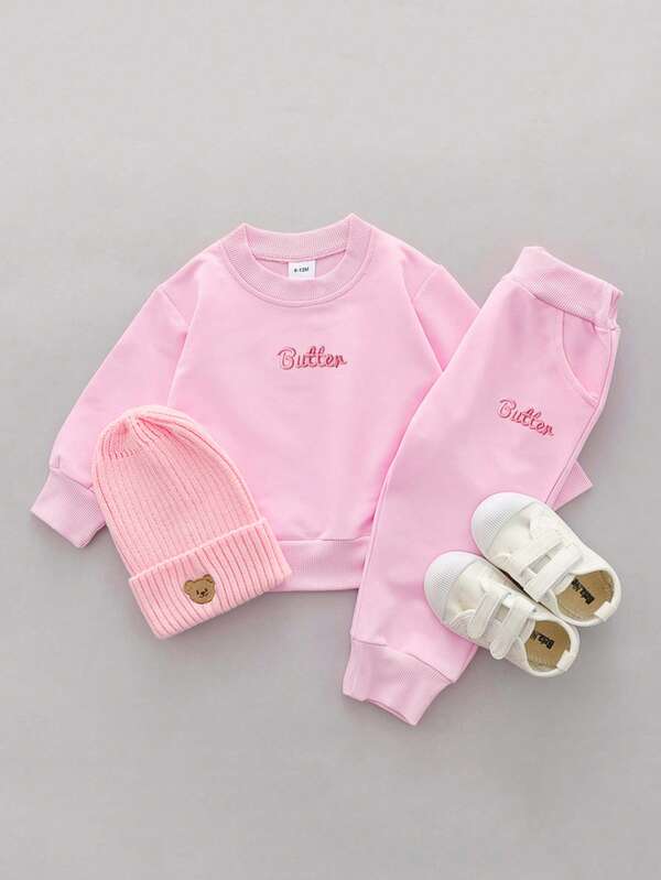 Conjunto de 2 peças de blusa e calça de manga comprida com bordado de letras minimalistas e gola redonda para meninas