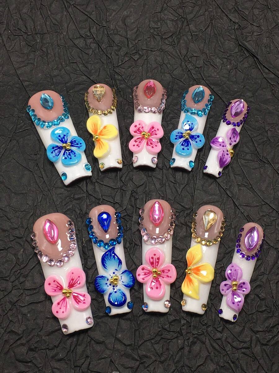This Is A 10-Piece Handcrafted Coffin-Shaped Press-On Nail Set-A Colorful 3D Floral-Style Extended Press-On Nail Collection. With White And Light Pink As The Base, It Is Paired With Handcrafted 3D Colorful Floral Decorations In Shades Of Blue, Yellow, Pink, And Purple, Complemented By Matching Rhinestone And Bead Edging, Presenting A Lively And Sweet Overall Style. - Nhiều màu - Xem 1