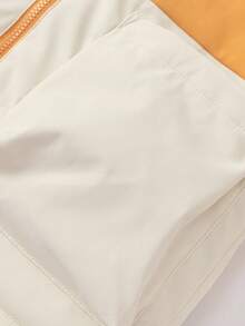 Balabala Jaqueta infantil com capuz e estampa colorblock, ideal para o inverno de 2025 e para aquecer os olhos.