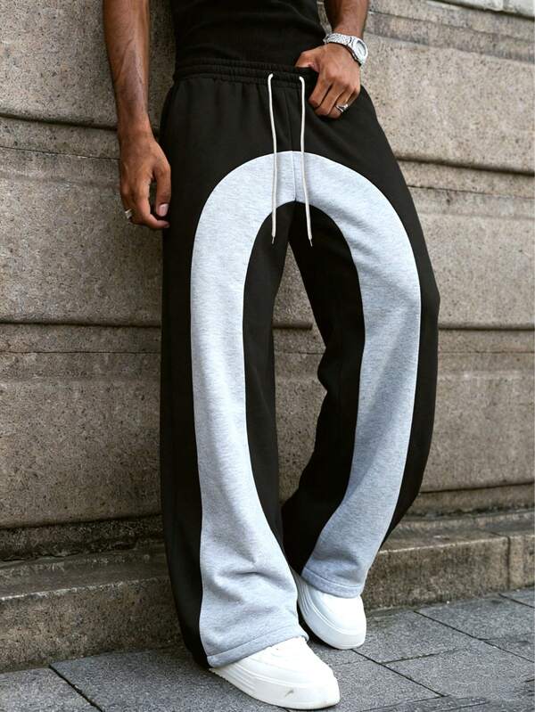 Męskie spodnie dresowe w czarno-szarym kontrastowym kolorze z modnym, swobodnym wzorem patchworkowym