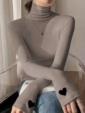 Blusa de cuello alto de manga larga con estampado de corazón, ajuste delgado para mujer, primavera/verano