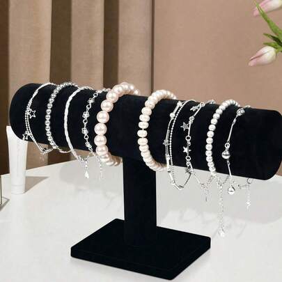 1 Giá trưng bày vòng tay thanh chữ T nhung đen thanh lịch - Giá để đồ trang sức để bàn, Quà tặng Ngày của Mẹ, Thích hợp cho tủ trưng bày bán lẻ, Không cần điện, Đế nhựa chắc chắn, Tuyệt vời để đựng vòng cổ, vòng tay và đồng hồ, Giá để đồng hồ nhung, Bề mặt nhung mềm mại dành cho phụ nữ, Giá để đồ đa năng để bàn, Không dùng điện - Thích hợp cho các loại lắp đặt khác của Tháp trang sức hình elip