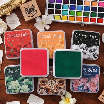 وسادات الحبر المحايدة، وسادات كبيرة فاخرة مغلفة، وسادات تجميع الصور، حاويات وسادات الحبر العتيقة، وسادات مزخرفة، وسادات DIY، تقنيات تخفيف الضغط، التغليف المتقدم، التخزين المنظم، صبغات عالية الجودة، أحبار فنية، فنانو تجميع الصور، محترفون إبداعيون، وسادات الحبر، وسادات المخطط الرجعي، وسادات المخطط والختم، إلخ.