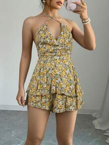 Vestido corto de mujer, estilo vintage, amarillo con estampado floral, sin mangas, espalda descubierta, escote halter cruzado, corte en A y bajo acampanado. - Amarillo Mostaza - Ver 3