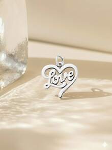 A Set Of Minimalist And Unique Silver-Colored Pendant Series, Including Chocolate Bar, Hollow Heart, Dinosaur, Solid Heart, Round Tag, Floral Medal, And Handbag Designs. These DIY Mini Pendants Make Exquisite Gifts For Family And Friends.