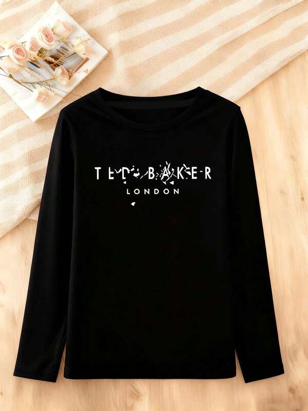 Comfortable Women's Long Sleeve Black Knitted T-Shirt Featuring A Classic Round Neck And Regular Fit, Crafted For Effortless Style And Daily Comfort.