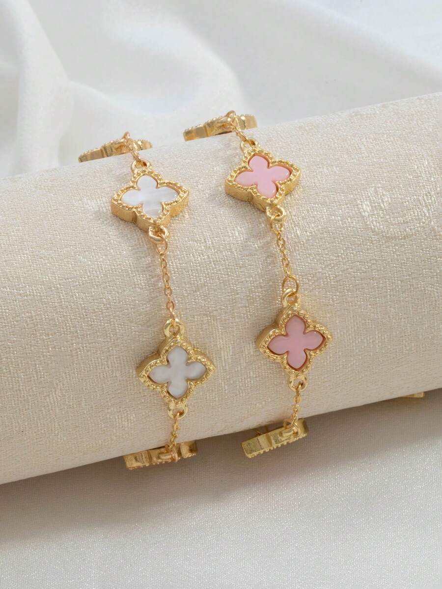 Bộ 2 vòng tay hình cỏ bốn lá may mắn cổ điển, có các màu đen, trắng, xanh lá cây và đỏ. - Hồng và trắng 1 - Xem 1