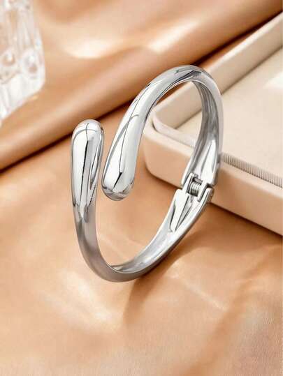 1 Stück mehrfarbiges symmetrisches Armband in Wassertropfen-Form. Exquisiter, süßer und eleganter Stil mit einem schlichten und retro Design. Europäischer und amerikanischer Stil, der hochwertige Qualität zeigt. Perfekt geeignet für den täglichen Gebrauch, Arbeit, Meetings, Partys, romantische Dates, Fotografie, Geschäftsverhandlungen oder jede andere elegante Gelegenheit.