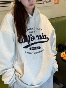 女士休闲宽松圆领抓绒卫衣，卡通字母印花，适合秋冬季穿着。 - 淺花灰 - 查看 1