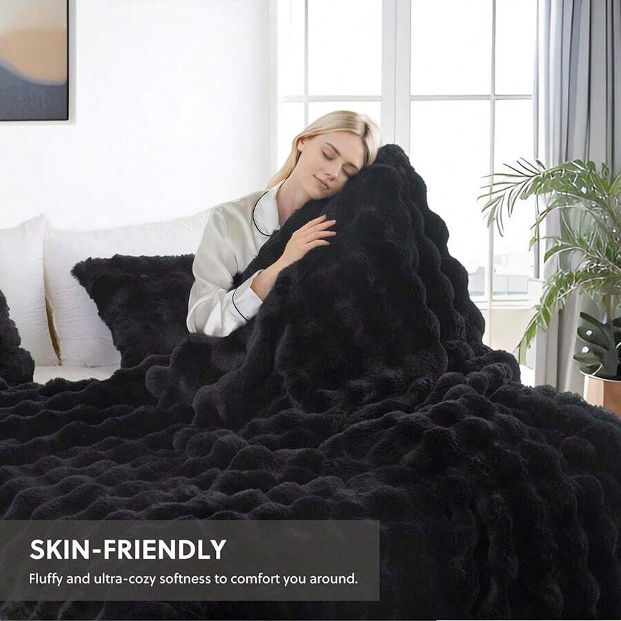 1条奢华仿貂绒毛毯，加厚双层柔软蓬松，触感如云朵般柔软，适用于家居、客厅、卧室、沙发等场所，也是提升家居生活品质的绝佳礼物。