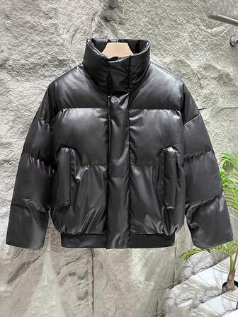 男士立领长袖羽绒服，时尚落肩冬季保暖外套，填充物和PU皮革面料