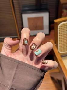 10 pezzi di unghie finte corte e quadrate, realizzate a mano, di colore marrone e verde con effetto occhio di gatto e stelle, carine, delicate, con riflessi, adatte a donne e ragazze, per primavera, estate, autunno, inverno, per vacanze e uso quotidiano