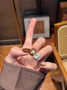 10 pezzi di unghie finte corte e quadrate, realizzate a mano, di colore marrone e verde con effetto occhio di gatto e stelle, carine, delicate, con riflessi, adatte a donne e ragazze, per primavera, estate, autunno, inverno, per vacanze e uso quotidiano