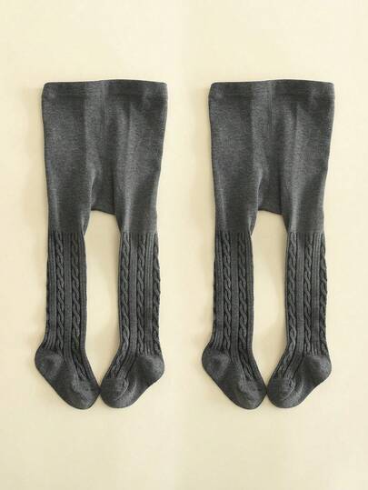 Bộ 2 món quần legging kẻ sọc và quần tất dệt kim cho trẻ em.