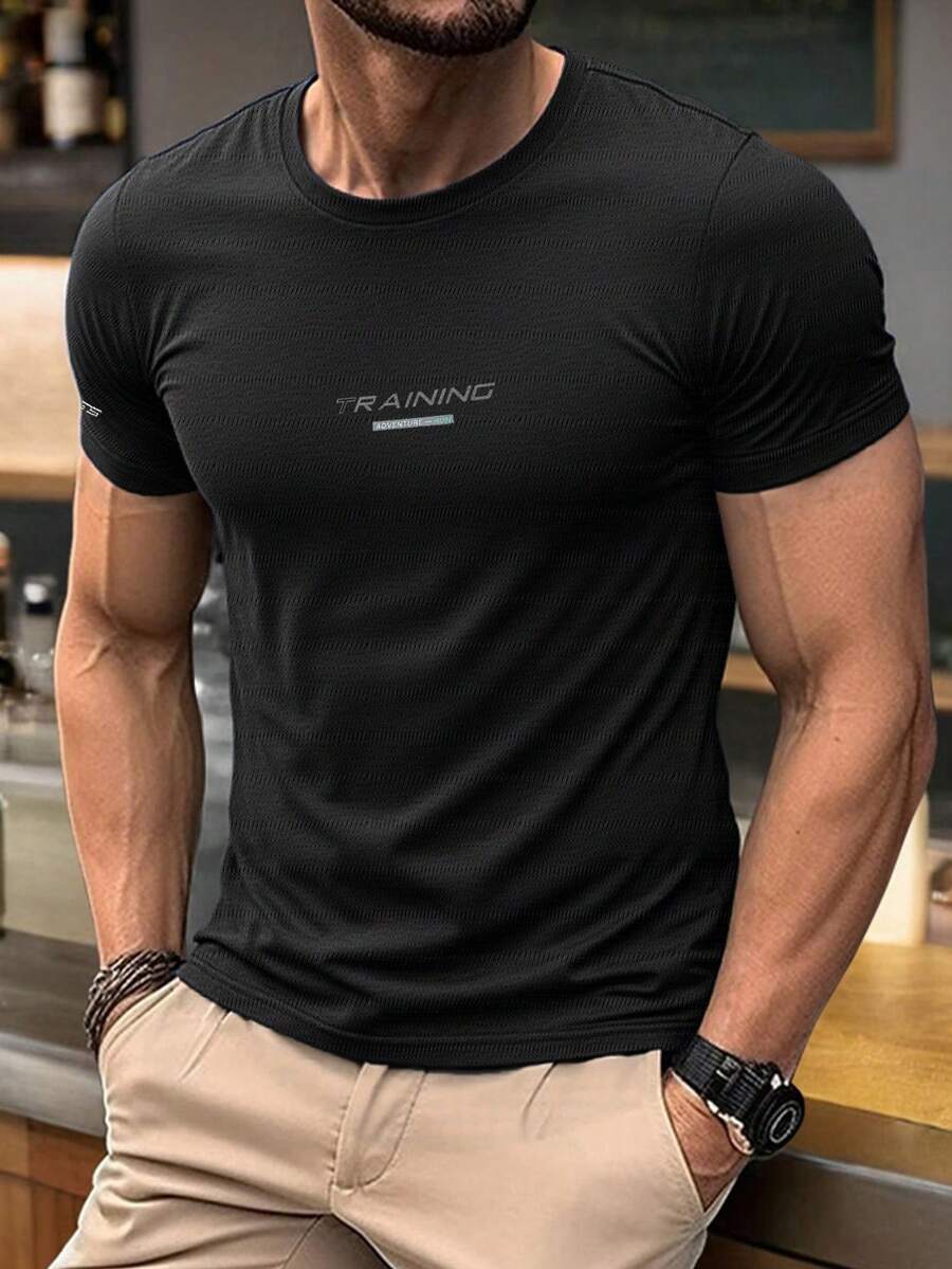 男士健身短袖T恤一件套 | 轻盈舒适的运动服 | 凉爽、有弹性、透气的跑步上衣 | 适合跑步和训练的运动上衣 | 速干、吸汗、轻盈 | 适合跑步和健身的运动服 - 黑色 - 查看 1