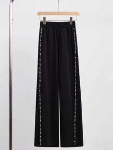 Pantaloni larghi eleganti da donna con vita elastica, tasche, patchwork e dettagli in finta perla - nero - Visualizzare 3